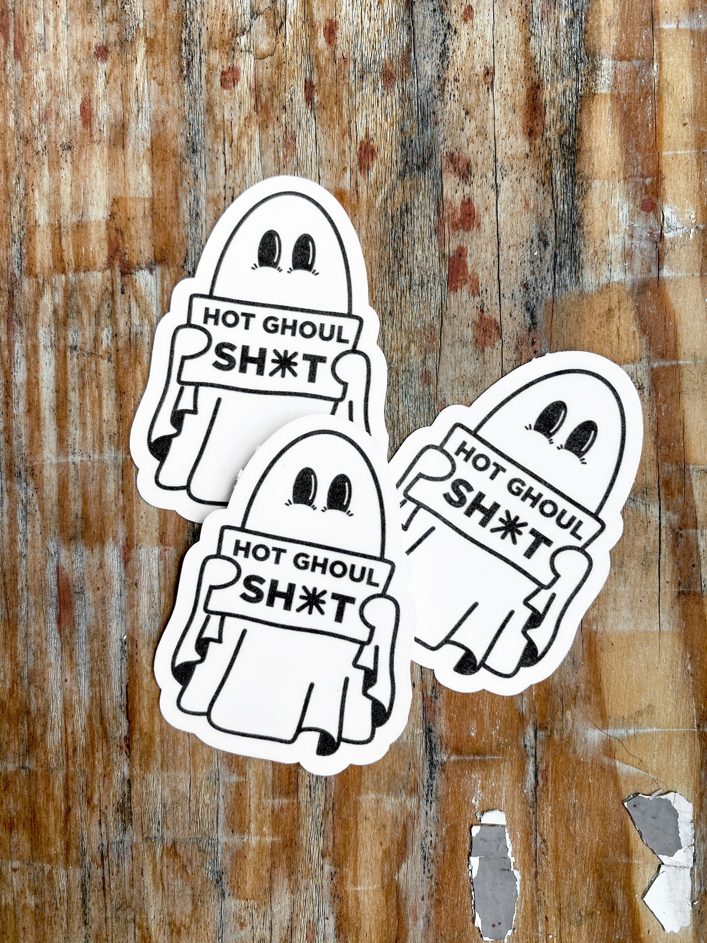 3 Hot Ghoul stickers of ghosts with big eyes holding sign that reads "hot ghoul sh*t'